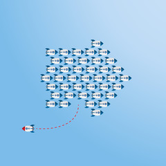 Think differently concept. Be different. Red rocket changing direction. New idea, change, trend, courage, creative solution, innovation and unique way concept.