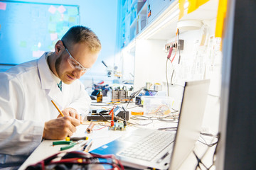 Man working in electronic research workshop