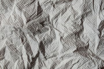 rough crumpled gray paper napkin as background