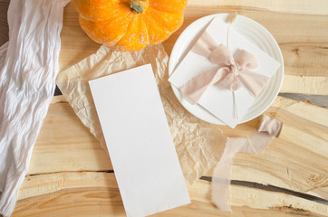 Autumn composition. Pumpkin halloween concept. Flat lay, mockup white paper