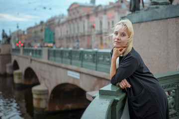 A woman walks through the center of St. Petersburg. Russia