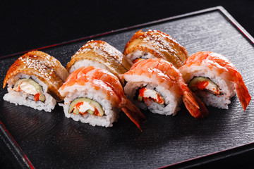 Japanese food, tasty of meal for lunch. Seafood. Sushi with Shrimp and eel black background.