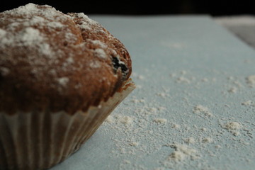 cake with raisins on a blue background