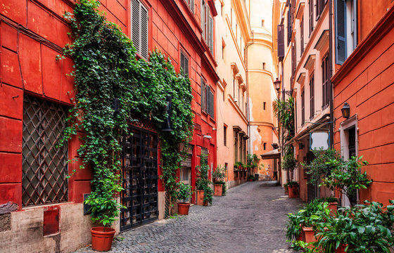 Fototapeta Old medieval streets of Rome, Italy. Exterior, architecture and landmark of ancient streets in Rome.