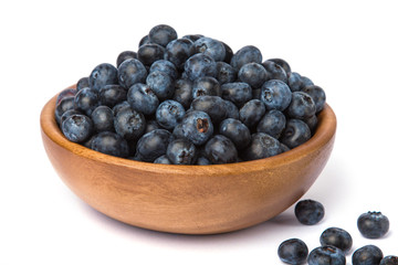 Blueberries in bowl isolated on white background.