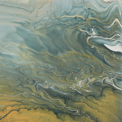 art photography of abstract marbleized effect background. gray, pewter blue and gold creative colors. Beautiful paint.