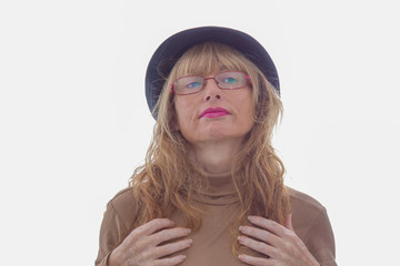 senior adult woman with hat and glasses isolated on white background