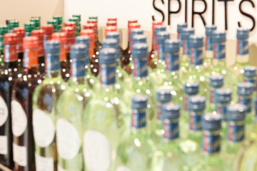 Blurred image of showcase of alcoholic beverages