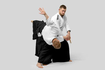 Two caucasian men are practicing aikido with waakizashi (isolation path included)