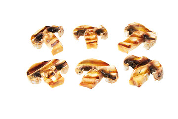 Grilled sliced champignons isolated on white background