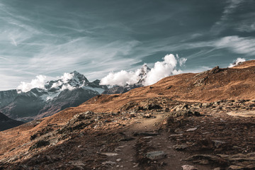panorama view of Matterhorn behind the clouds