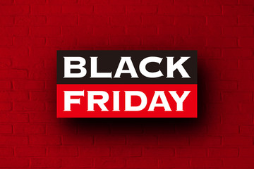 Obraz premium BLACK FRIDAY の文字, ブロック塀,赤背景