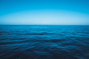 Fototapeta na wymiar seascape, ocean horizon and blue sky
