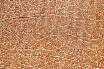 orange leatherette texture background close up	