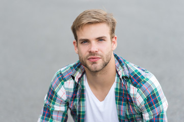 facial care. macho guy outdoor. street style. man sit ground. carefree student guy. free time...