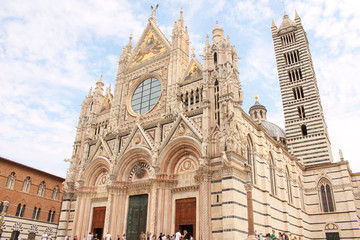 The huge majestic cathedral of Saint Mary of the Assumption on the Duomo Square, a medieval church in Siena, Tuscany, Italy