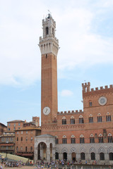 Piazza del Campo with the Pubblico palace and Mangia tower , the principal public space of the historic center of Siena, Tuscany, Italy. It is regarded as one of Europe's greatest medieval squares