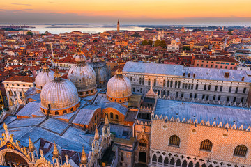 Aerial view of domes of Basilica di San Marco and Doge's Palace (Palazzo Ducale) in Venice, Italy....