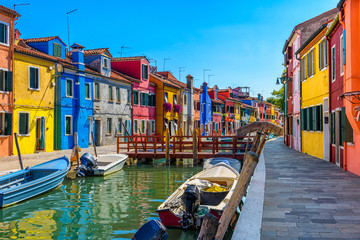 Street with colorful buildings in Burano island, Venice, Italy. Architecture and landmarks of...