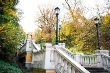 A picturesque landscape. Stone staircase. Staircase in autumn park. Park staircase on autumn day. Art staircase construction. Classic design and architecture