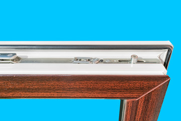 Fragment of a new plastic window with lamination