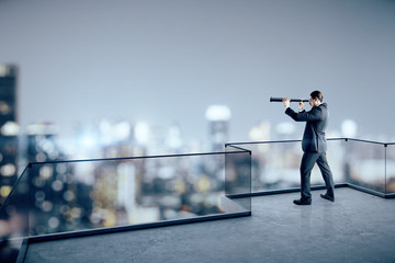 Attractive businessman on rooftop