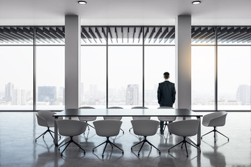 Businessman in modern meeting room