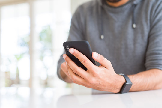 Close up of man using smartphone