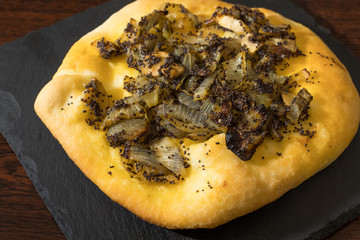 Homemade cebularz, Traditional Polish pancake with onion and common poppy seeds, from Jewish tradition, baked in Lublin, Poland.