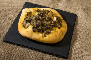 Homemade cebularz, Traditional Polish pancake with onion and common poppy seeds, from Jewish tradition, baked in Lublin, Poland.