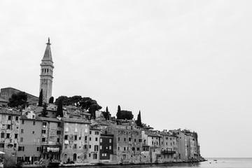 The old town of Rovinj on a hilly peninsula, surrounded by the Adriatic Sea in Croatia.