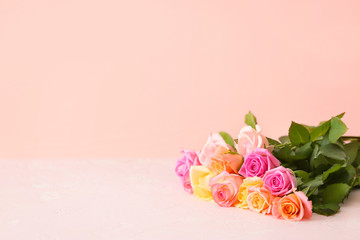 Bouquet of beautiful rose flowers on light background