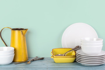 Kitchen dishes and utensils on a shelf