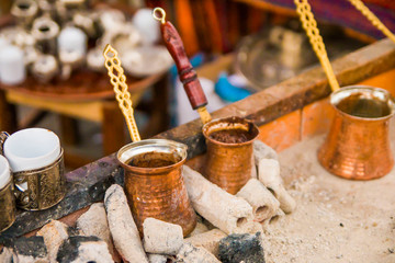 Turkish coffee cooked in copper coffee pot