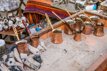 Turkish coffee cooked in copper coffee pot