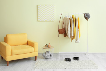 Interior of hall with clothes rack