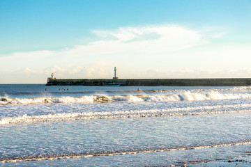 People on kayaks in North Sea near South Breakwater, Aberdeen, Scotland