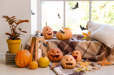 Creative decorations for Halloween party near window in room