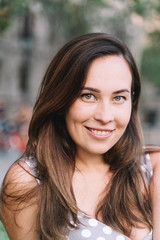 Portrait of pretty woman in the city