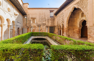 Seville, Andalusia / Spain - September 9, 2019: Royal Alcazar. Maidens Courtyard.