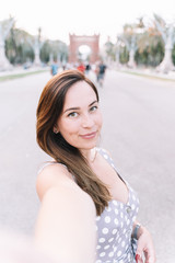 Portrait of pretty woman in the city