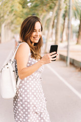 Portrait of pretty woman in the city