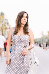 Portrait of pretty woman in the city