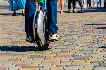 Man riding monowheel in the city park © ihorbondarenko