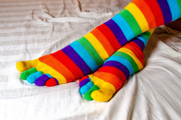 male legs in colorful lgbt socks
