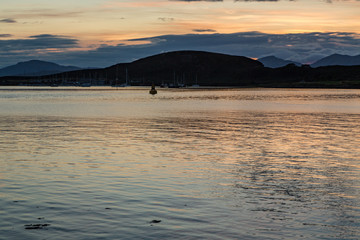 Shimmering Sunset in the Harbor of Oban, Scotland