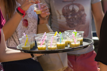 Tray of smoothies at street food festival