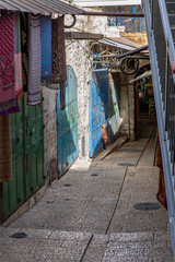 Fototapeta premium A Steep Dark Passageway Deep Inside the Holy City, Jerusalem, Israel