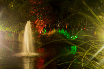 Fountain illuminated by the artificial lights