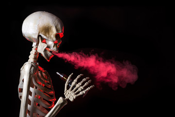 Skeleton vaping clouds of red highlighted vapor with an ecigarette